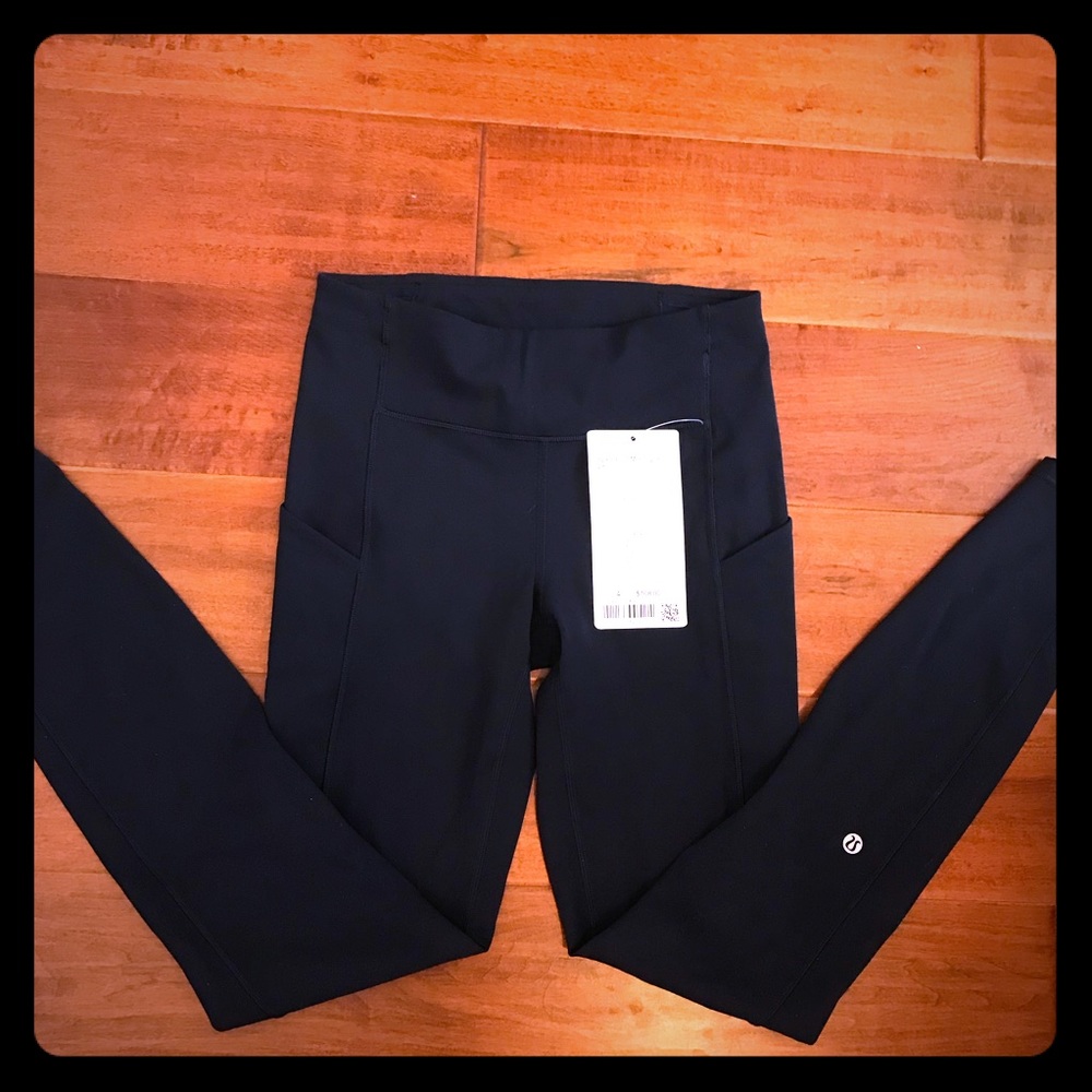 NWT Mid-rise speed up tight 28” Navy color